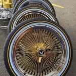 245/40R20 Vogue tires with gold spokes