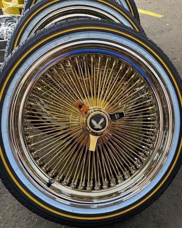 245/40R20 Vogue tires with gold spokes